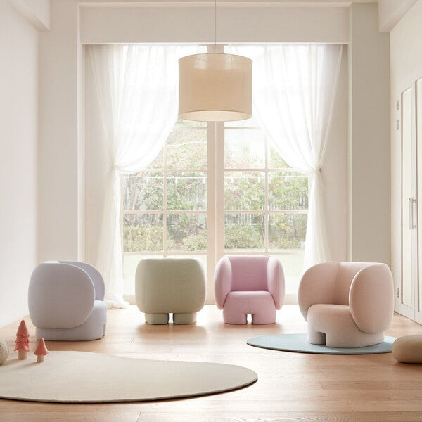 Iloom Dotto Kids Sofa: four pastel loungers in lavender, mint, pink and peach arranged in a sun