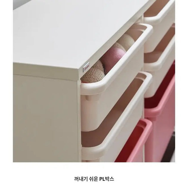 ILoom Eddi Kids 3-Story Bookshelf 1400W with W PL box storage; white frame, pastel pink drawers being pulled out.