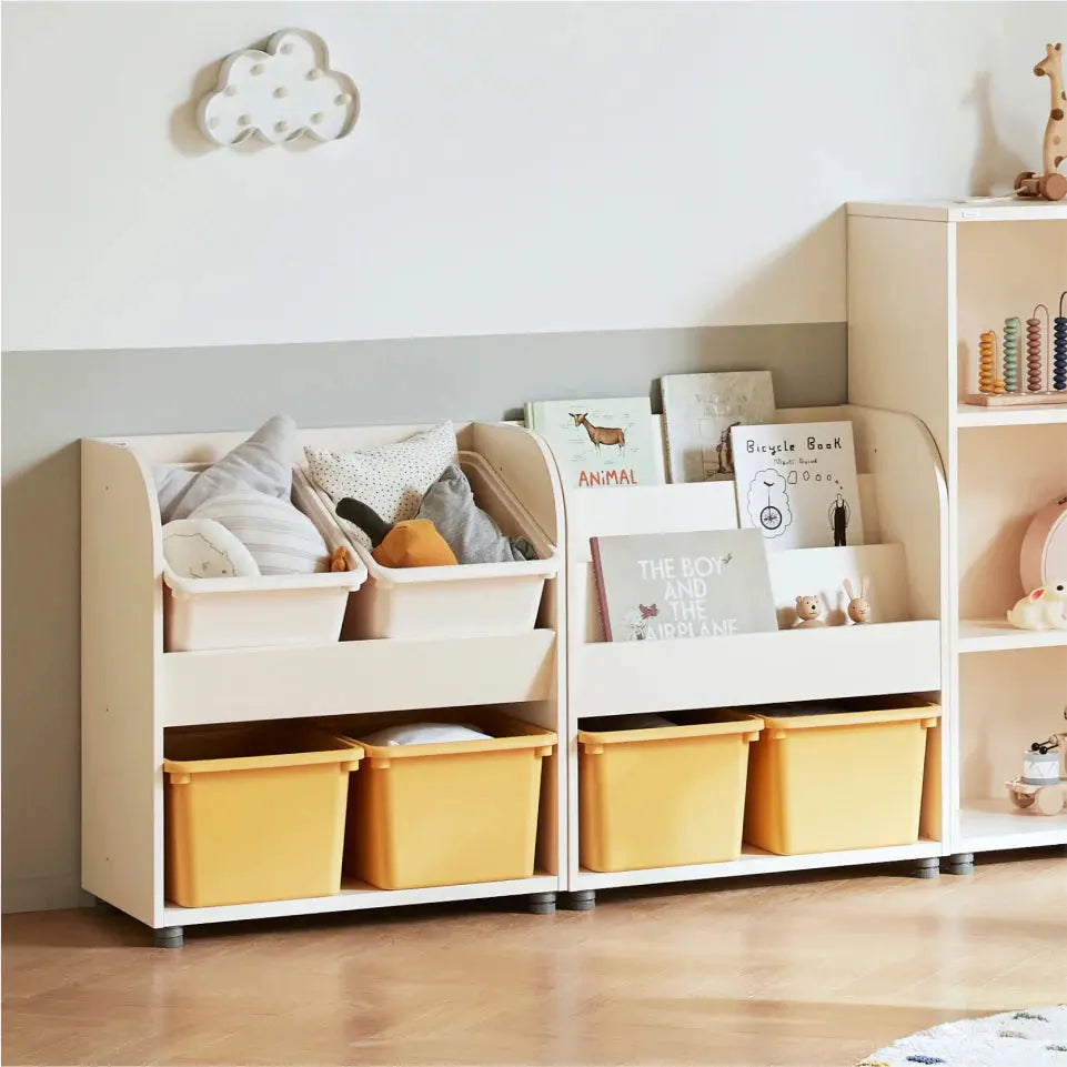 Iloom Eddi Kids Bookshelf in white with yellow storage bins; books and toys neatly stored, forming a cozy reading nook.