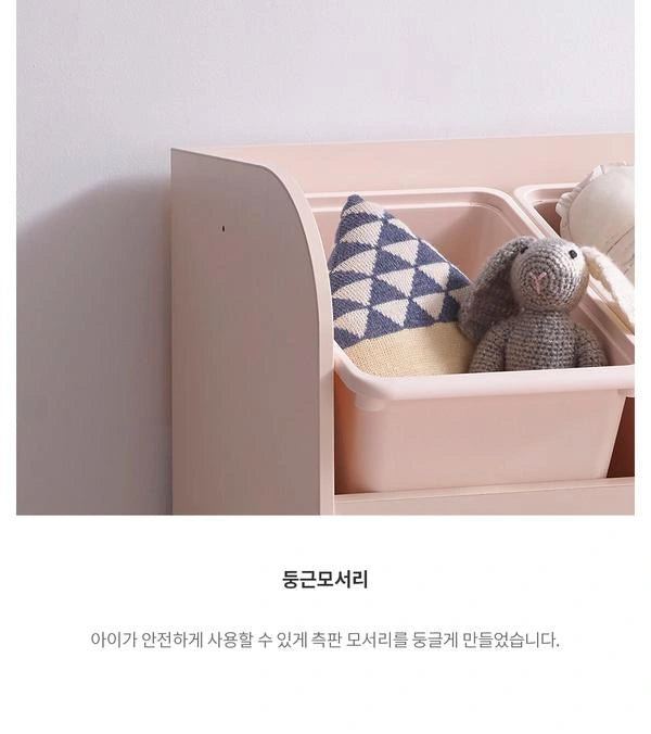 Rounded side-panel profile and edge detail of the ivory-toned Eddi Kids storage frame.