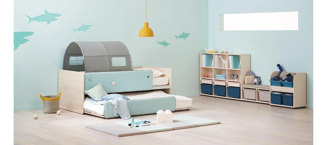 Storage within a coordinated room: The six-bin 1400W bookcase is shown with other Eddi furniture.