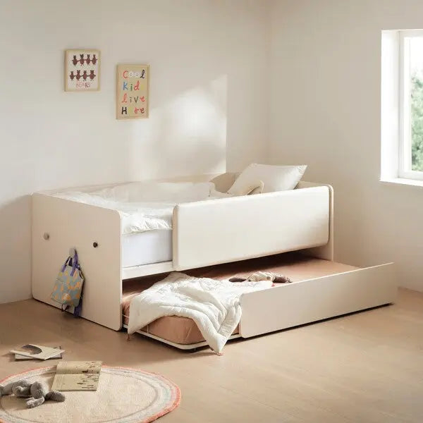 ILoom Eddi Kids Sliding Bed in white with open under-bed drawer showing a folded blanket.
