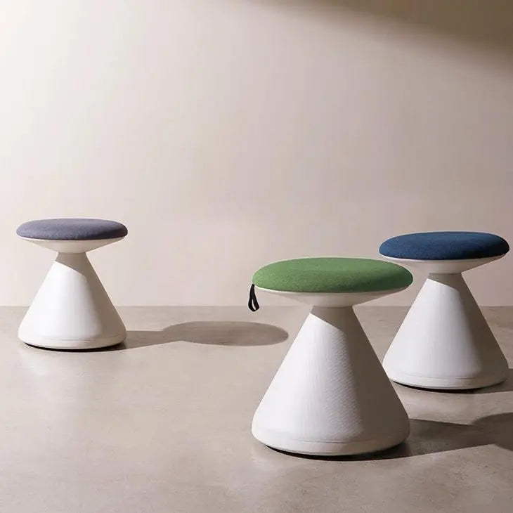 Iloom Fungus Chair trio: white conical pedestals with purple, green, and blue cushions.