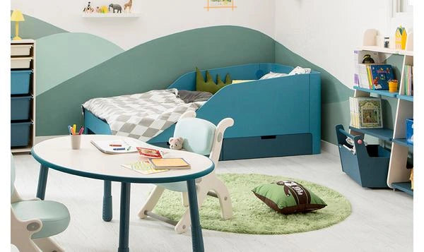 A coordinated Sky-blue arrangement: Sky-blue drawer fronts are illustrated with a matching bed.