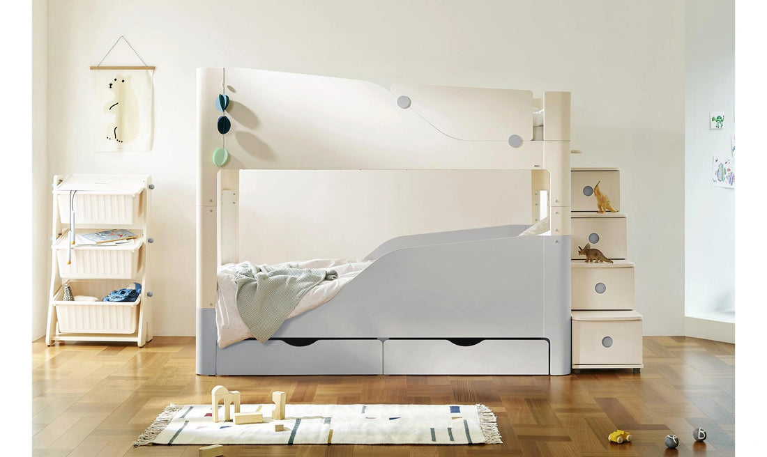 Grey storage in a coordinated bedroom: The Grey drawers are shown beneath separate Tinkle Pop bed furniture.