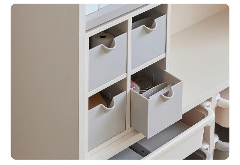 Open and close using the finger grip: Each mini drawer has a shaped finger grip for opening and closing. This handling detail is not a pinch-proof or soft-close rating.