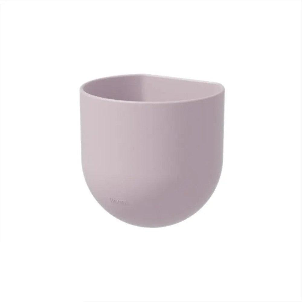 ILOOM Linki Plus multipurpose pencil holder in soft pink, round curved desk organizer holding pens upright.