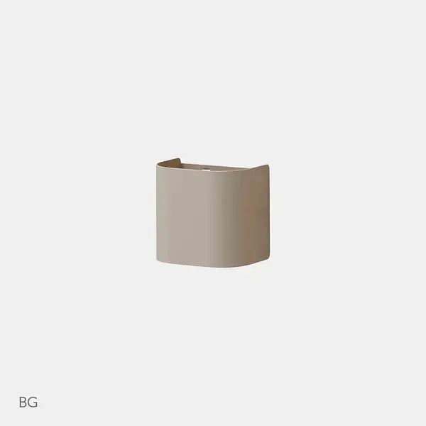 Iloom Pencil Case in beige curved rectangle, resting upright on a clean desk to organize items.
