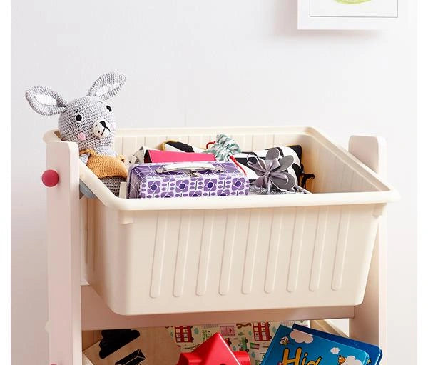 Three large bins for everyday belongings: Three plastic bins provide separate places for playthings and activity materials.
