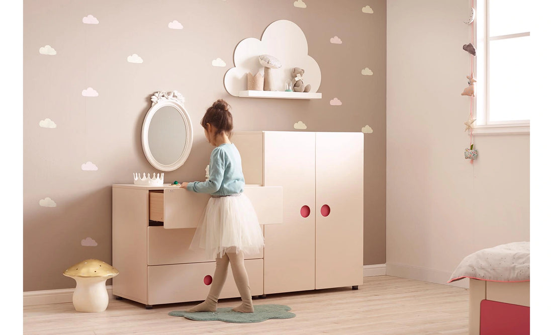 Everyday storage in a bedroom: The Pink three-drawer dresser is shown beside a separately purchased two-door wardrobe.