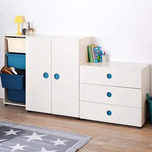 ILOOM Tinkle Pop Wardrobe 800W white storage set with blue knobs, paired with a dresser in a tidy kids room.