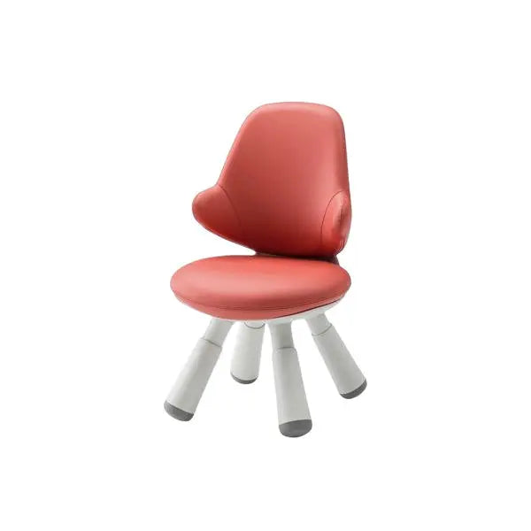 Iloom Wing Kids Chair in coral red with four white angled legs, ready for a child to sit.