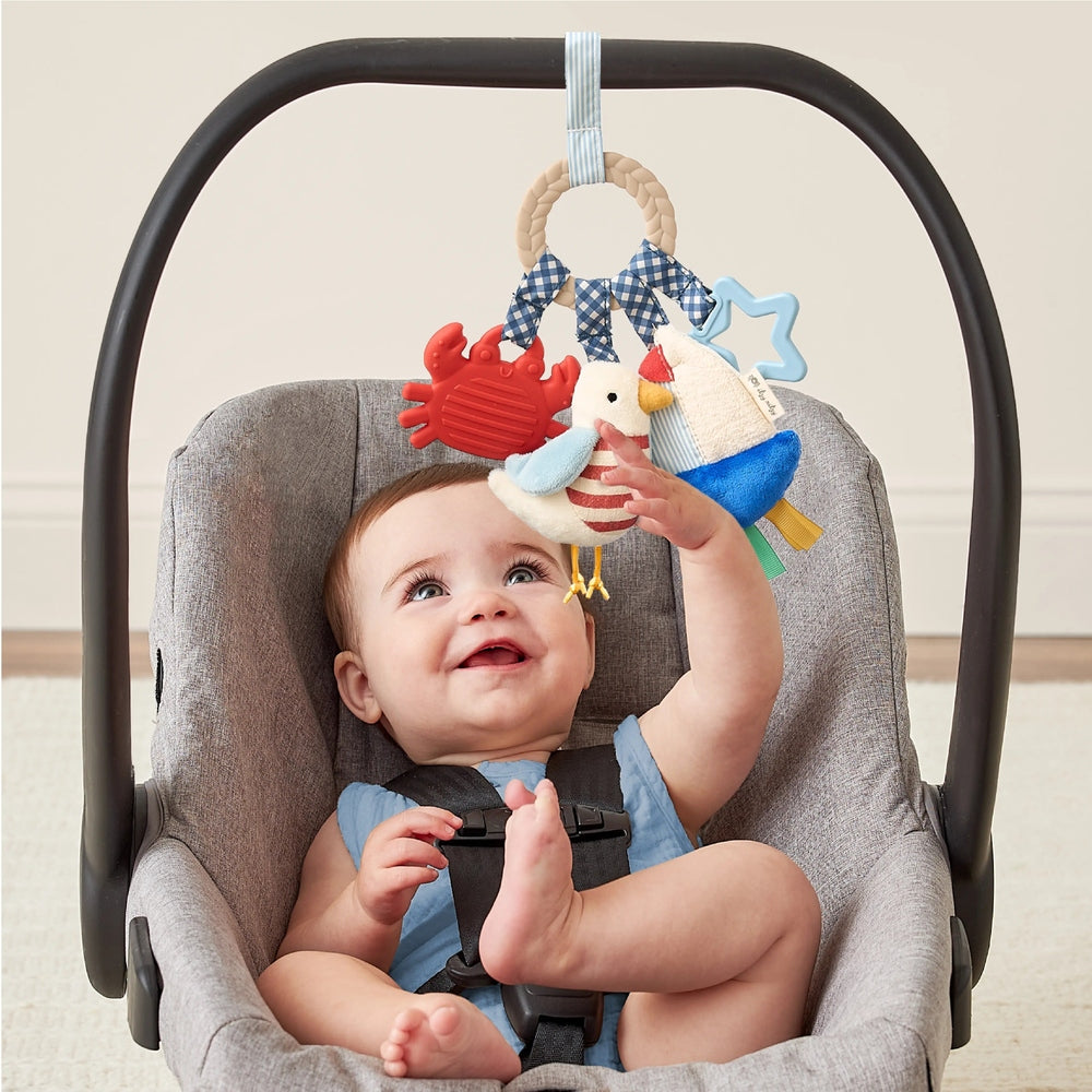 ITZY RITZY Itzy Ritzy Bitzy Busy Ring Teething Activity Toy nautical themed with crab seagull sailboat star and gingham bow img 3/27