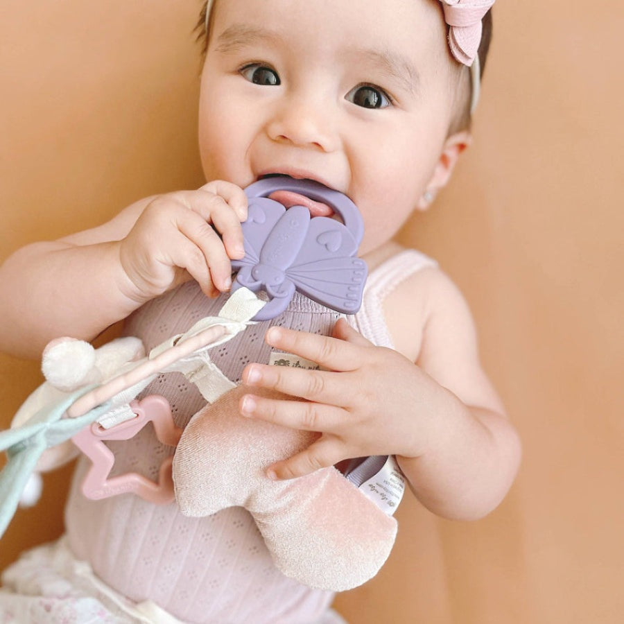 ITZY RITZY Itzy Ritzy Bitzy Busy Ring Teething Activity Toy elephant-shaped silicone teether with ribbons and pom-pom img 8/27