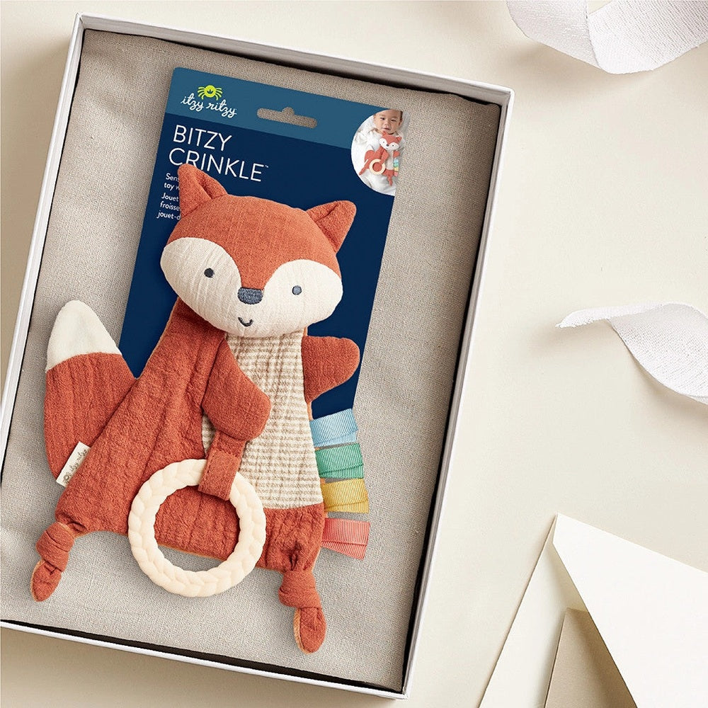 Itzy Ritzy Bitzy Crinkle sensory fox toy with teether, orange plush, cream belly, braided ring