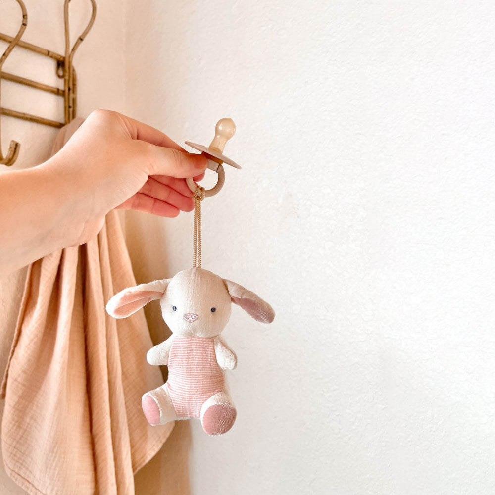 ITZY RITZY Itzy Ritzy Bitzy Pal Natural Rubber Pacifier & Stuffed Animal orthodontic pacifier set shown in image 6 of 32 with rounded shield