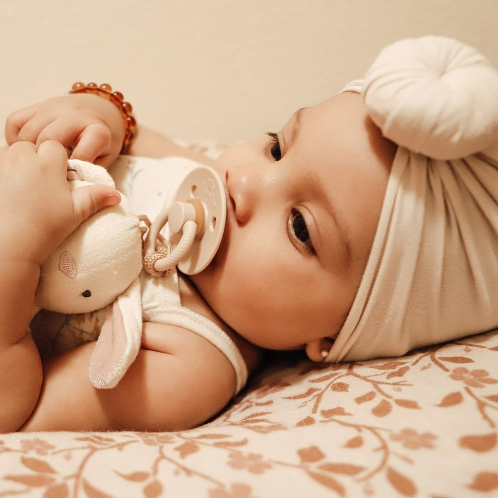 ITZY RITZY Itzy Ritzy Bitzy Pal Natural Rubber Pacifier & Stuffed Animal orthodontic pacifier set shown in image 7 of 32 with rounded shield