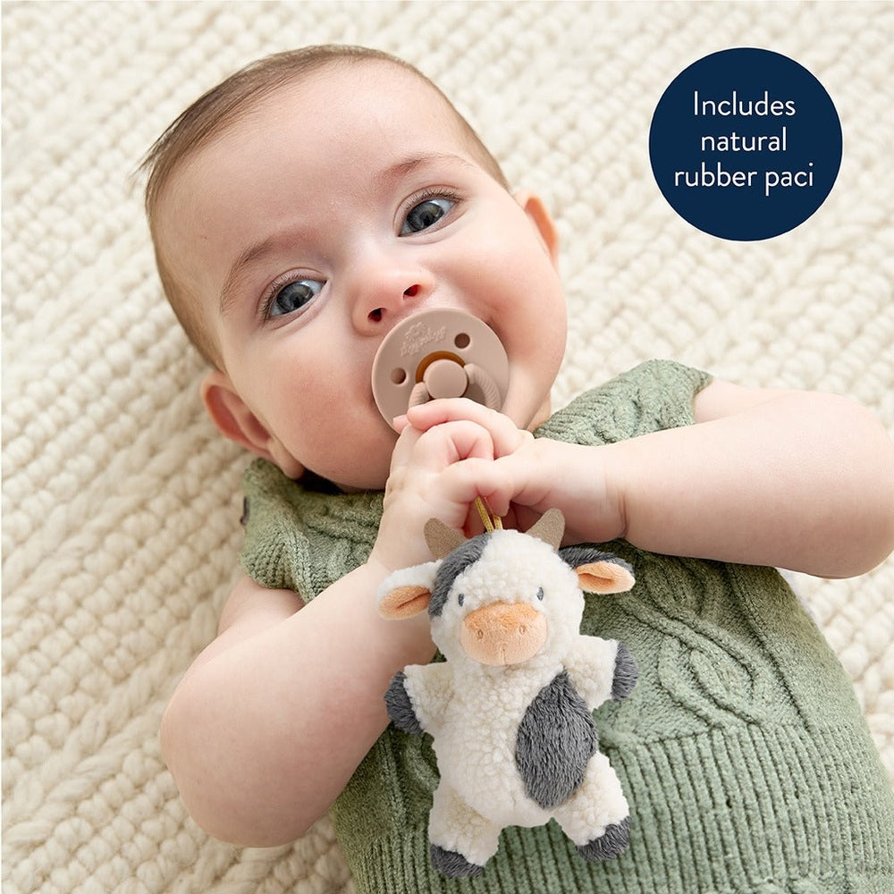 Itzy Ritzy Bitzy Pal Natural Rubber Pacifier & Stuffed Animal in Beige pacifier with cream-gray cow plush