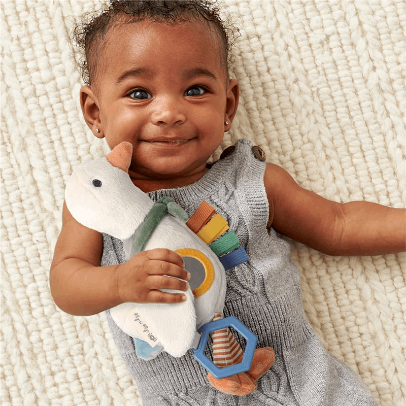 ITZY RITZY Itzy Ritzy Bitzy Traveler plush animal with stacked rings, ribbon tags, and teethers img 5/18