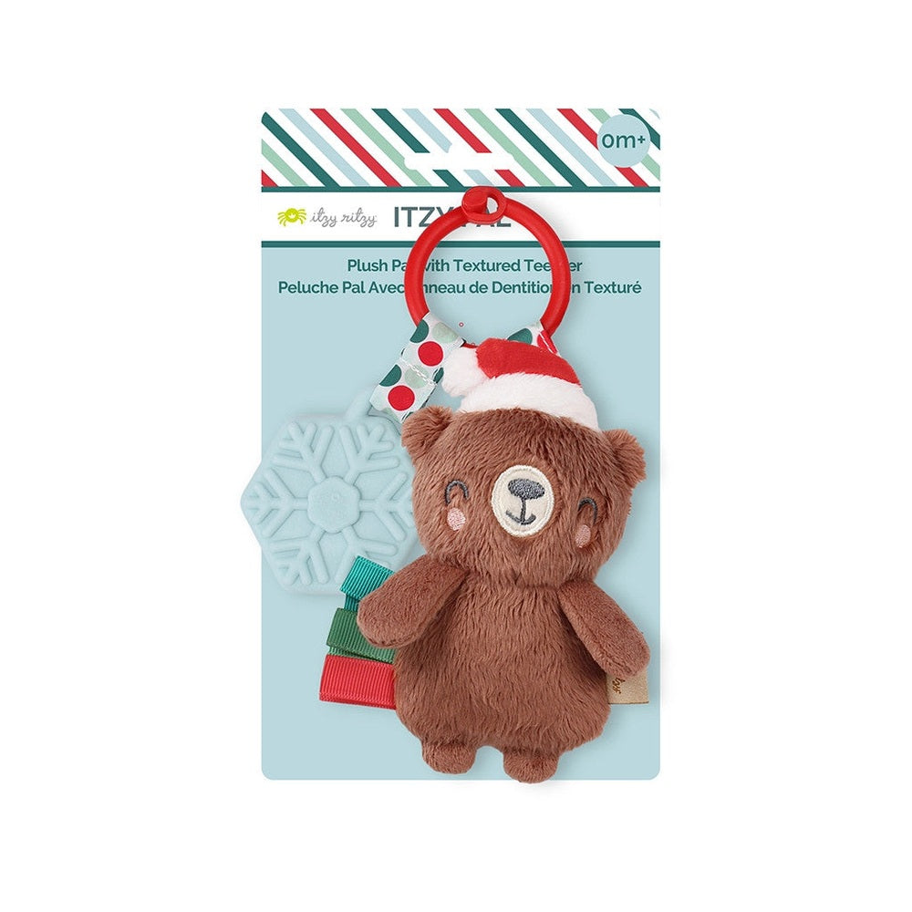 Itzy Ritzy Holiday Itzy Pal Plush Teether: brown bear wearing a Santa hat, with red ring and snowflake teether.