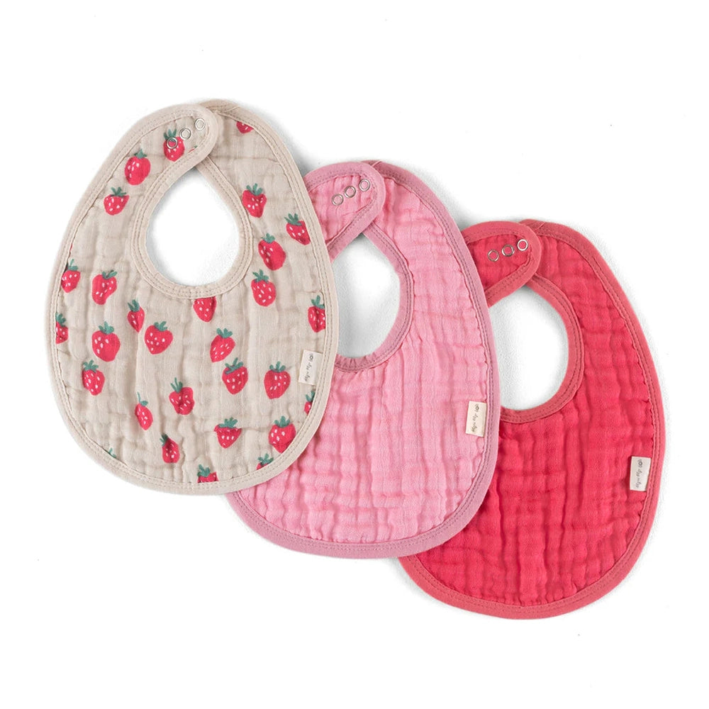 Itzy Ritzy Itzy Bibs set of 3 pastel quilted bibs with strawberry print, showing metal snap closures.