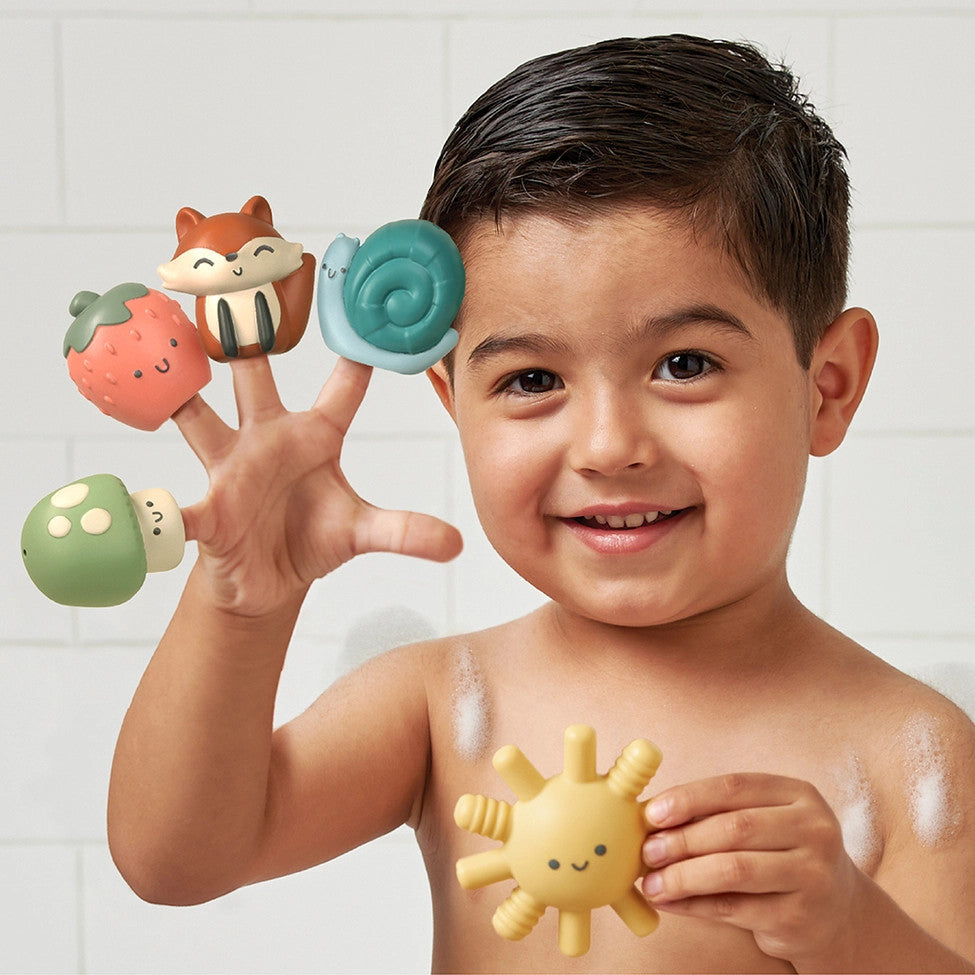 Itzy Ritzy Itzy Bitzy Puppets bath toys; 5 colorful animal and sun puppets held by a smiling child
