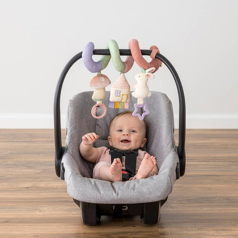 Itzy Ritzy Itzy Bitzy Spiral Car Seat Activity Toy with pastel plush shapes for baby
