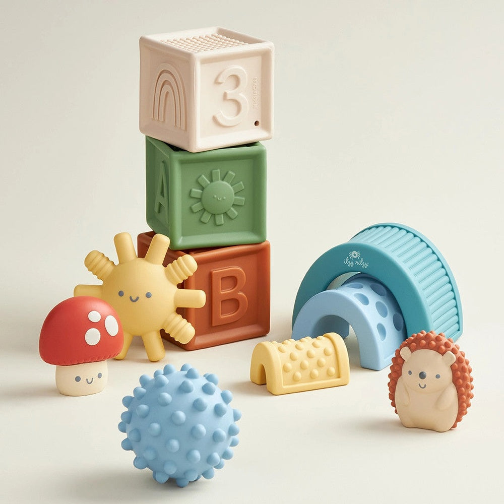 Itzy Ritzy Itzy Blocks sensory blocks set with pastel stackable cubes and playful figures for babies