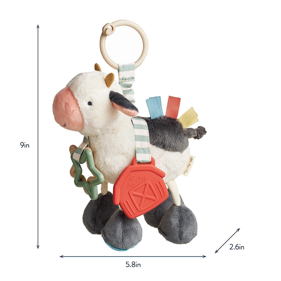 Itzy Ritzy Itzy Friends Link & Love Activity Plush cow toy with ring and ribbons
