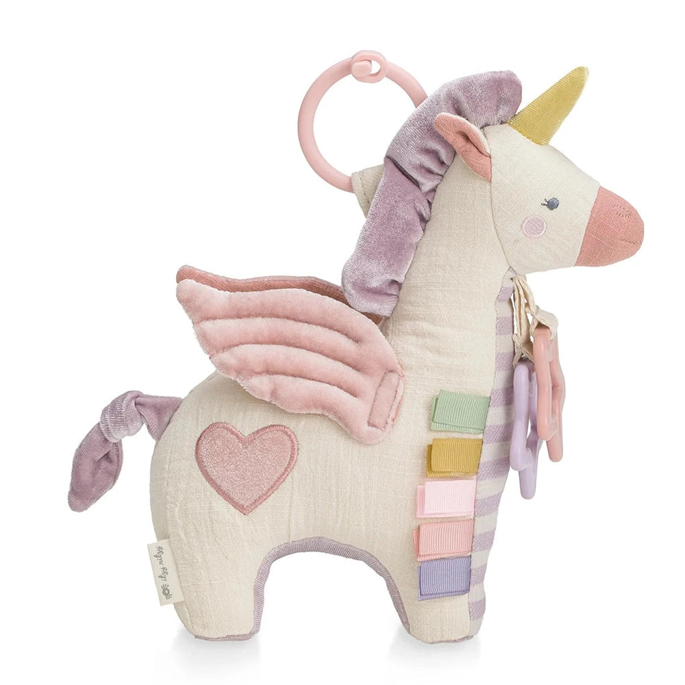 Itzy Ritzy Itzy Friends unicorn activity plush with pastel wings and linked rings for baby