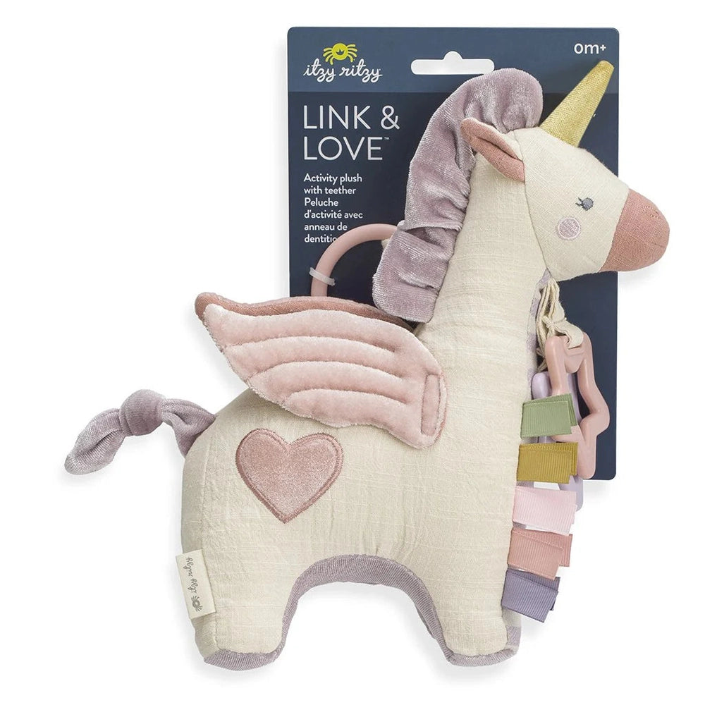 Itzy Ritzy Link & Love unicorn activity plush with teether links, pastel cream and pink wings