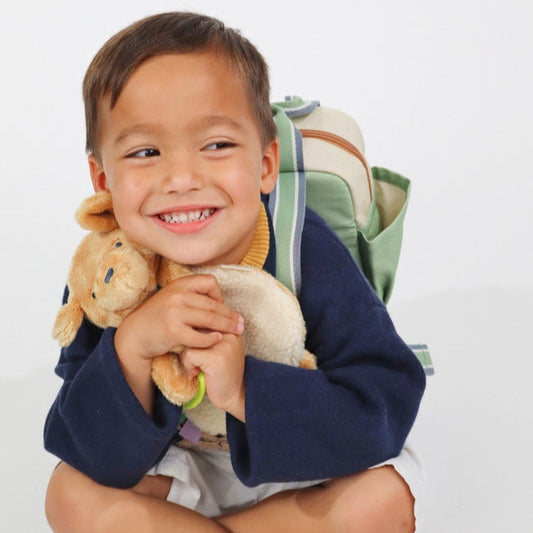 Itzy Ritzy Itzy Lovey plush and teether toy, beige plush with green teether
