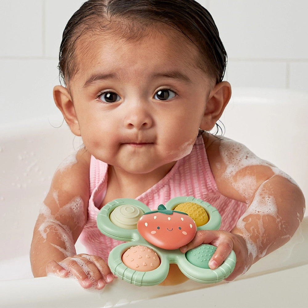 Itzy Ritzy Itzy Pop & Whirl bath toy, mint green with strawberry center, 1 piece
