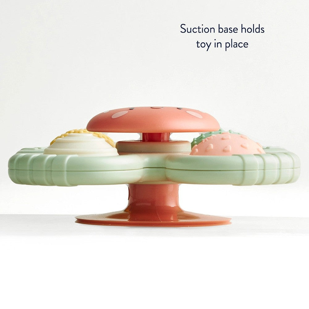Itzy Ritzy Itzy Pop & Whirl baby toy with pastel mint ring and pink mushroom top