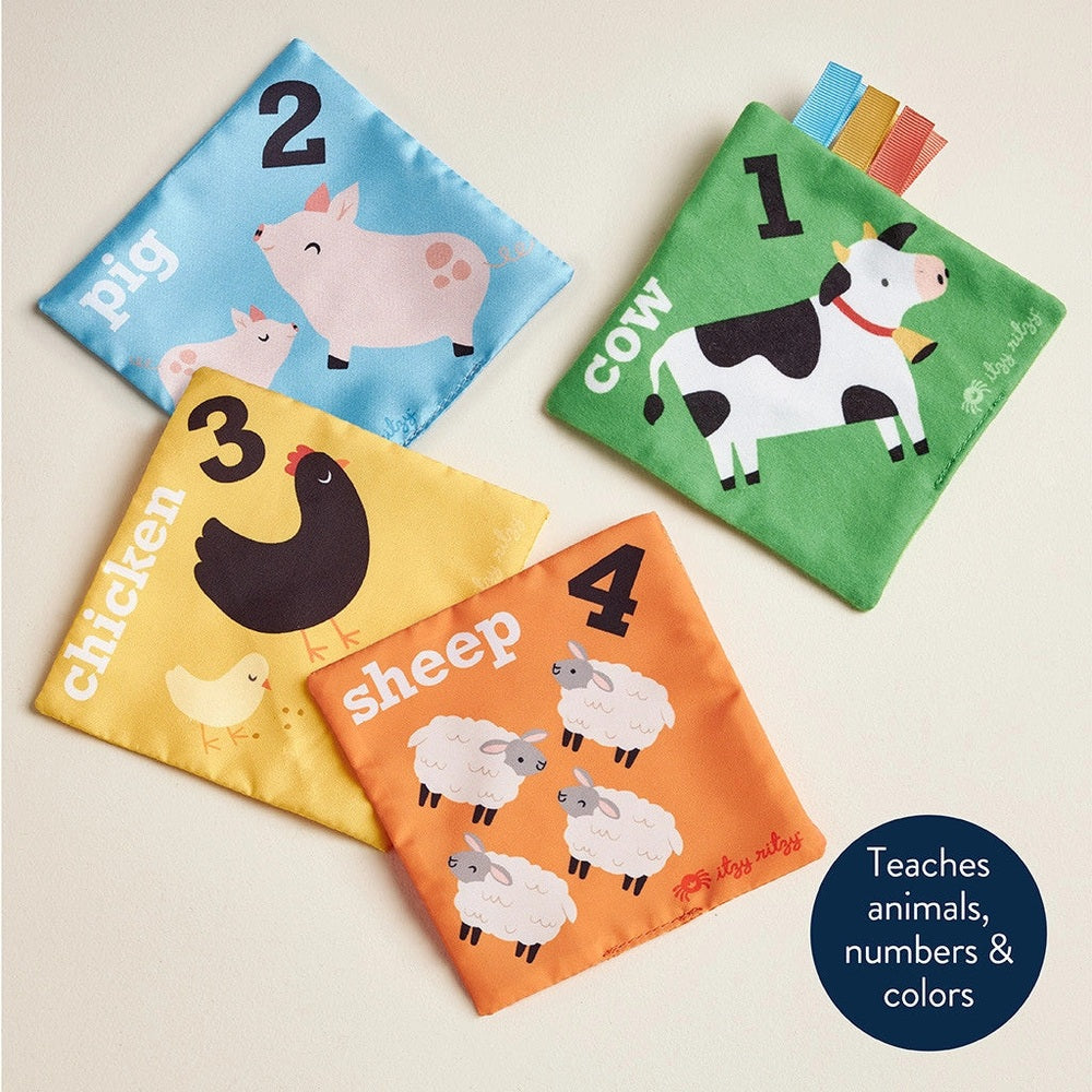 Itzy Ritzy sensory scarves set of 4 with farm animals and numbers in blue, green, yellow, orange