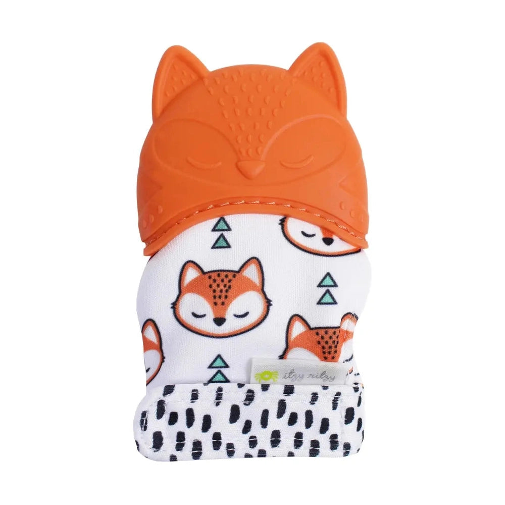 Itzy Ritzy Silicone Teething Mitt orange fox design shown worn on hand with white fox-print fabric and black-spotted cuff