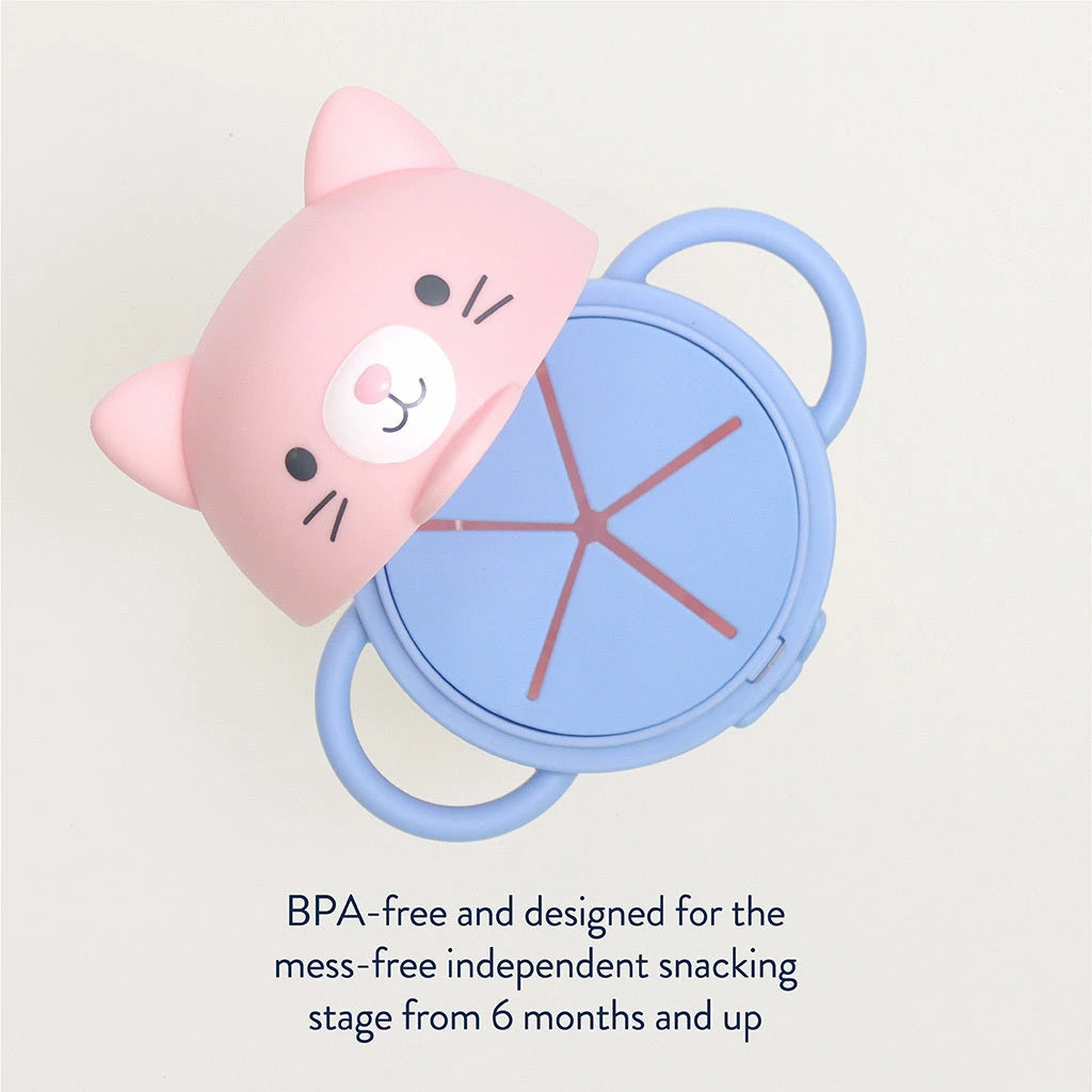 Top view of the Itzy Ritzy Itzy Snack Pal Kitty cup, showing the snack-access opening and attached lid.