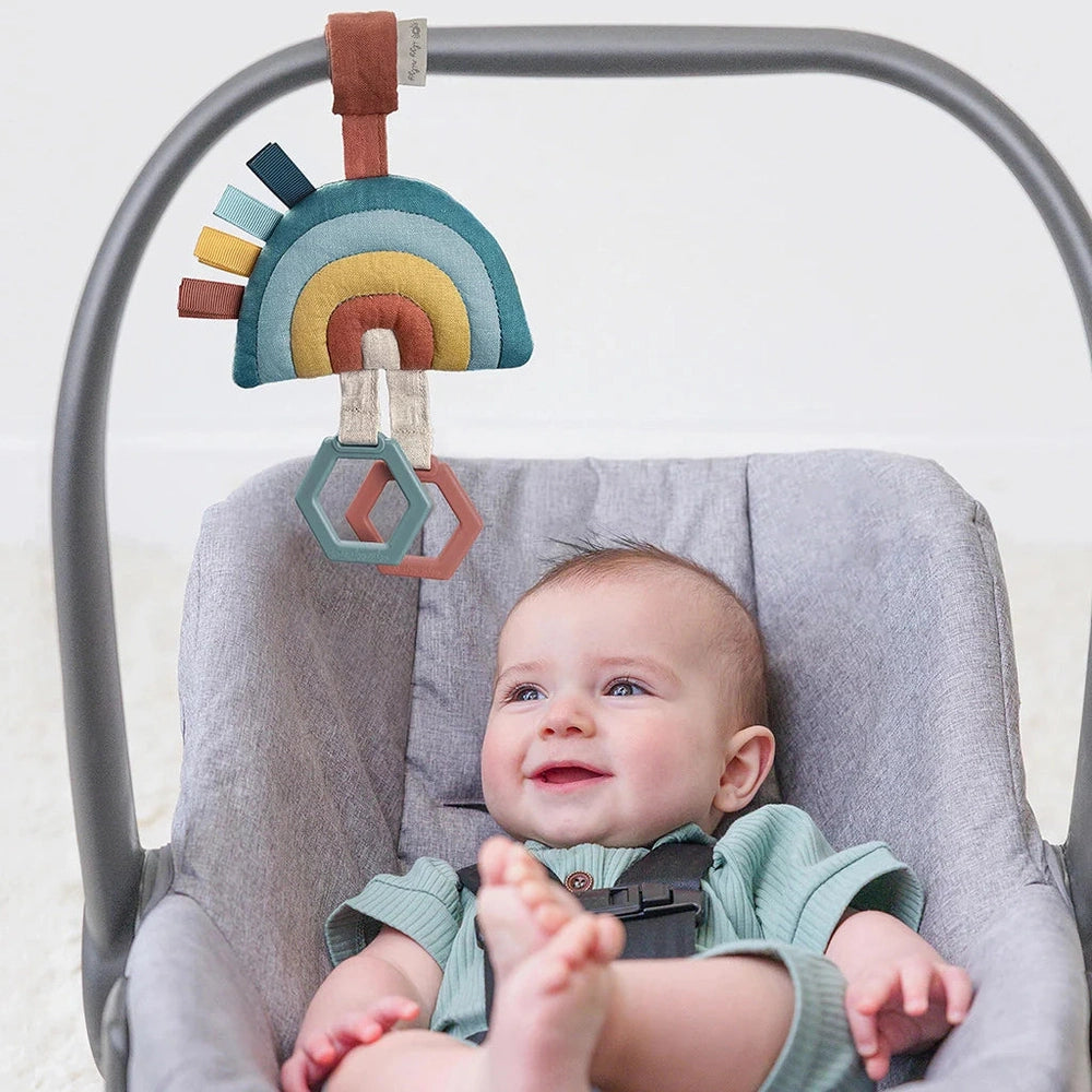 Itzy Ritzy JingleB Attachable Travel Toy rainbow plush arc with hexagon teether for baby