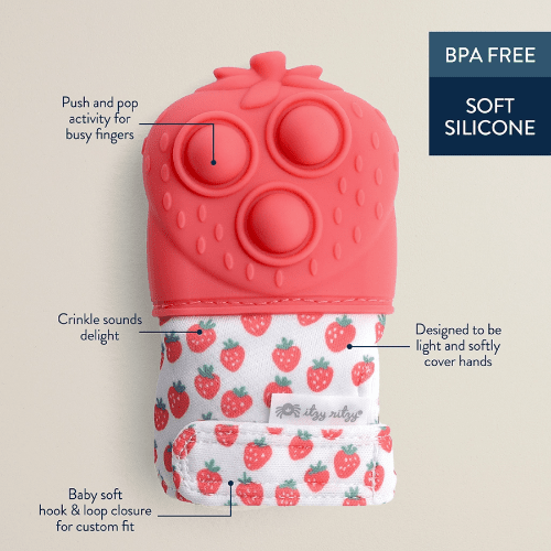 Itzy Ritzy Mitt Pop teething mitten in pink BPA-free silicone with strawberry sleeve; push-and-pop finger area.