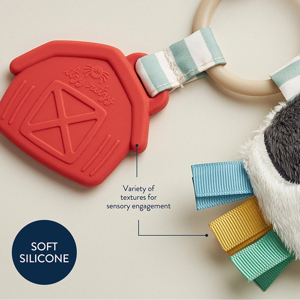 Itzy Ritzy Pal Plush and Teether red silicone teether with striped fabric ring and cuddly plush