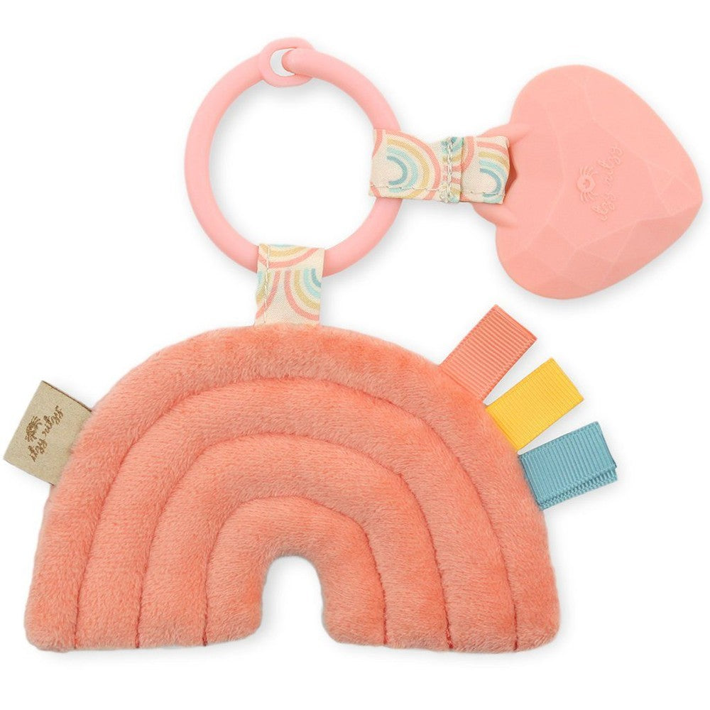 Itzy Ritzy Pal plush teether rainbow arch in coral pink with pastel ribbons and heart teether
