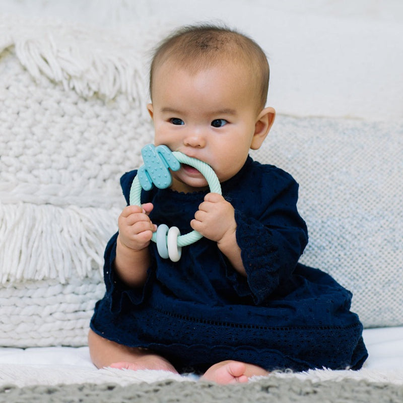 Itzy Ritzy silicone rattle teether mint green with cactus texture for babies
