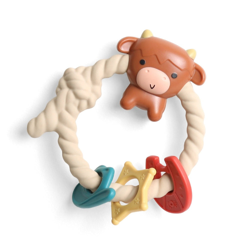 Itzy Ritzy cow rattle teether with beige braided ring and colorful star and clip shapes
