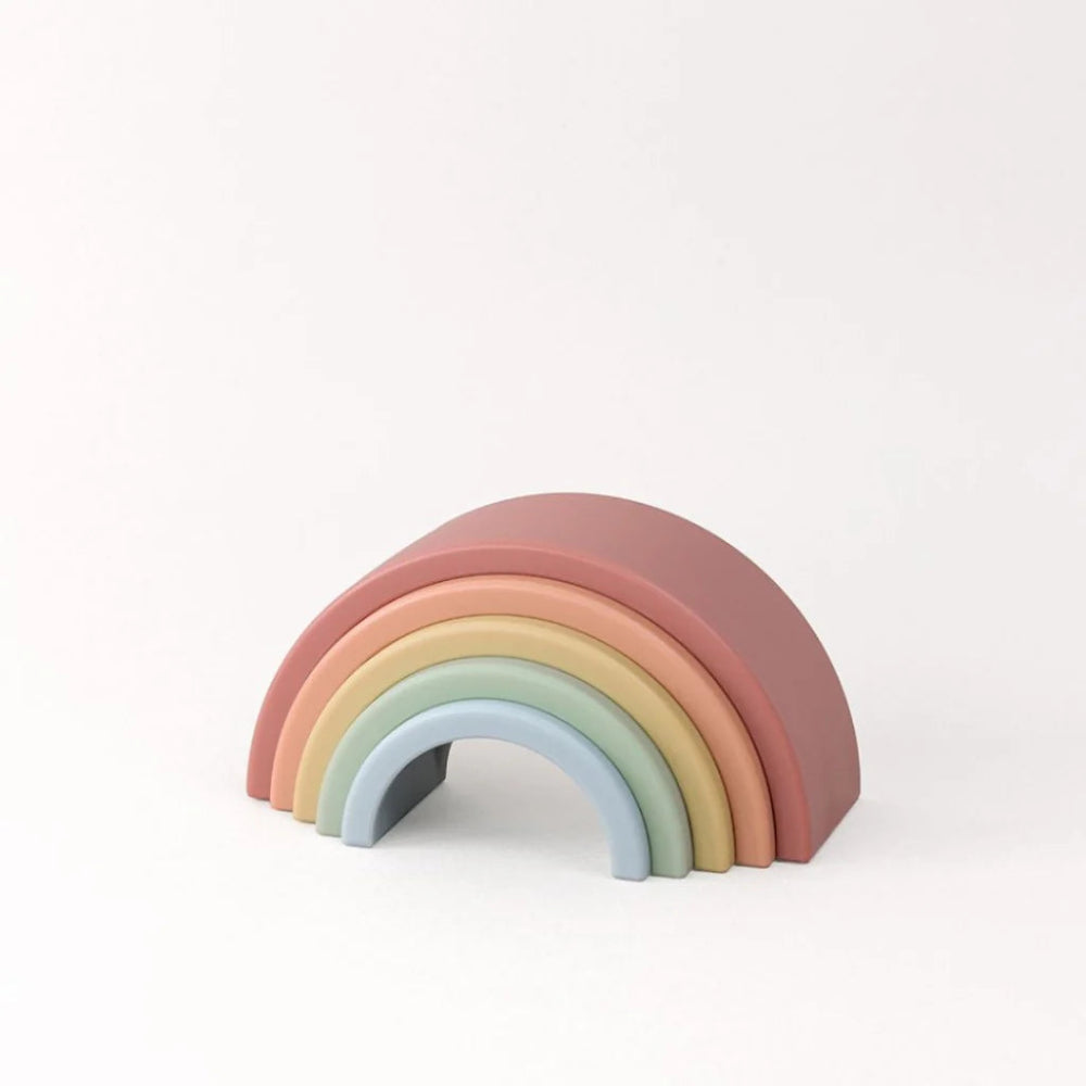 Itzy Ritzy Ritzy Rainbow stacking toy; set of 6 pastel arches in pink, coral, yellow, mint, and blue