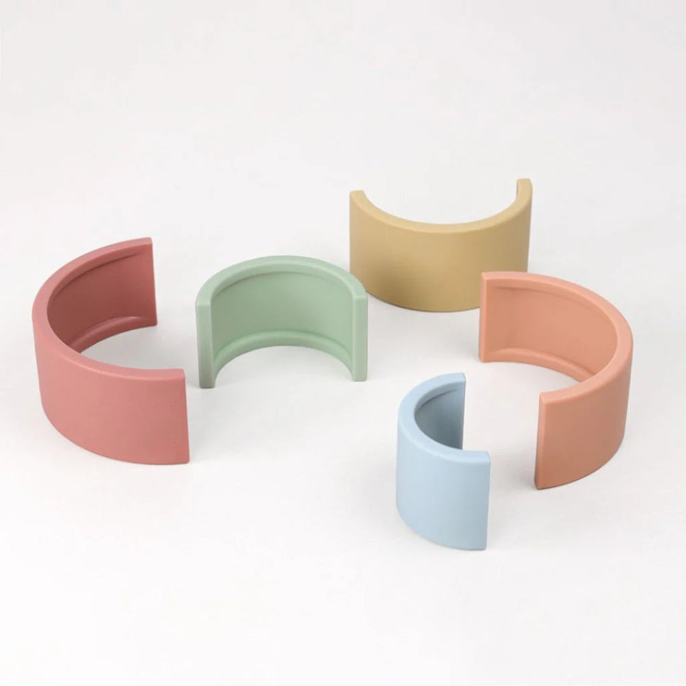 Itzy Ritzy Ritzy Rainbow stacking toy: set of 6 pastel curved blocks in pink, green, yellow, blue, peach