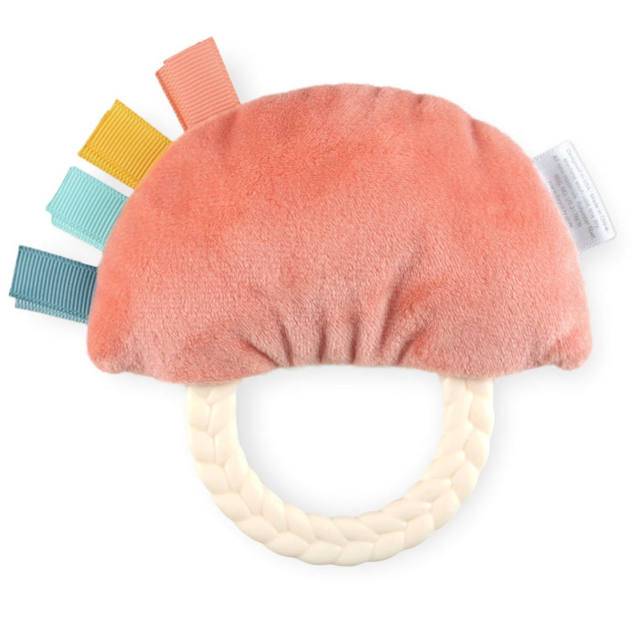 Itzy Ritzy Ritzy Rattle Pal plush rattle with teether, pink fuzzy body, cream braided handle, multicolor tabs