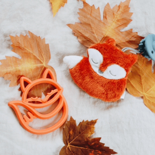 Itzy Ritzy Sweetie Pal pacifier and plush fox set, orange with clip and soft stuffed companion