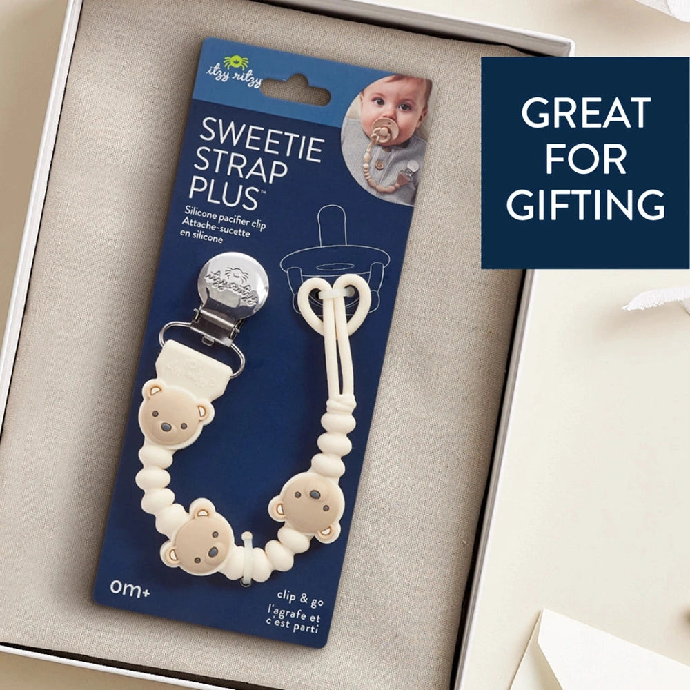 Sweetie Strap Plus pacifier clip by ITZY RITZY with cream bear beads and white silicone beads