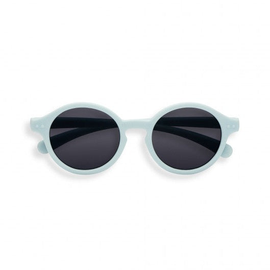 Izipizi Sun Baby Fresh Blue sunglasses with round light-blue frame and dark lenses.