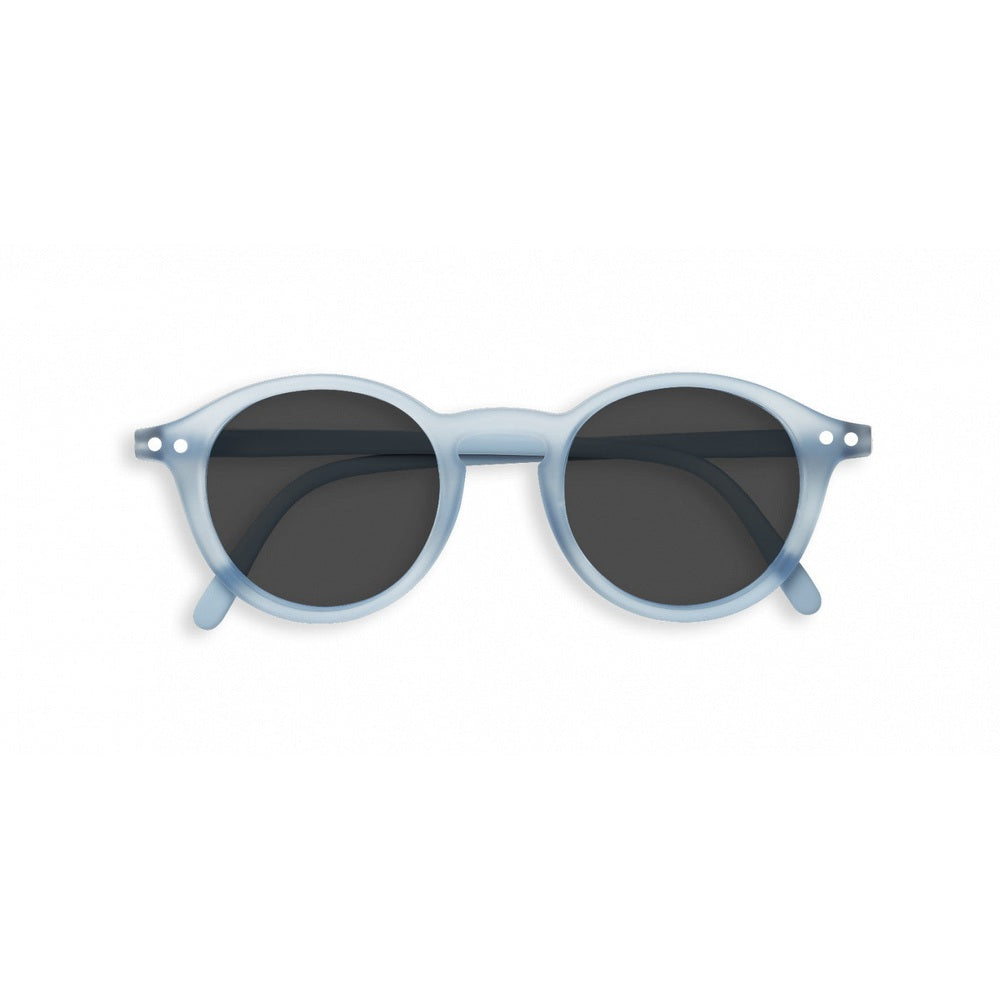 Izipizi Junior #D Cold Blue sunglasses with round light-blue frames and dark lenses.